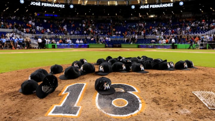 MIAMI, FL - SEPTEMBER 26: Miami Marlins leave their hats on the pitching mound to honor the late Jose Fernandez after the game against the New York Mets at Marlins Park on September 26, 2016 in Miami, Florida. (Photo by Rob Foldy/Getty Images)