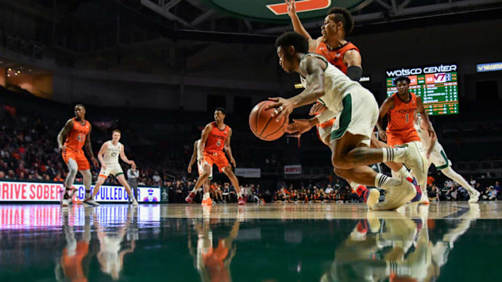 NCAA basketball: MIAMI, FL - JANUARY 30: Chris Lykes #0 of the Miami Hurricanes drives to the basket against the Virginia Tech Hokies during the second half at Watsco Center on January 30, 2019 in Miami, Florida. (Photo by Mark Brown/Getty Images)