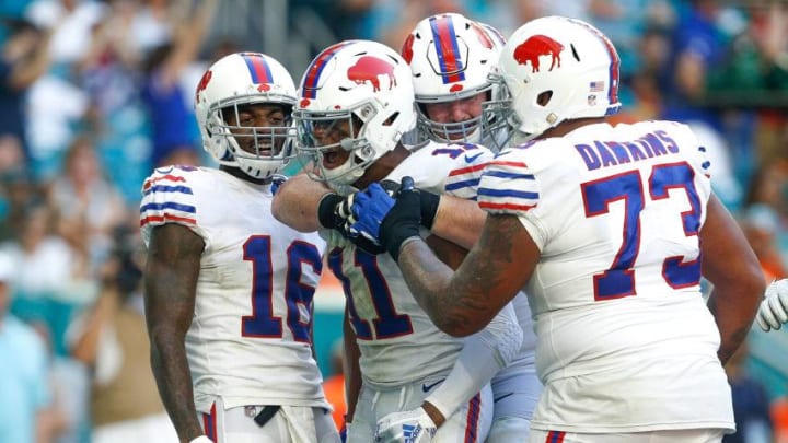 MIAMI, FL - DECEMBER 02: Zay Jones #11 of the Buffalo Bills celebrates with teammates after a touchdown reception against the Miami Dolphins during the second half at Hard Rock Stadium on December 2, 2018 in Miami, Florida. (Photo by Michael Reaves/Getty Images)