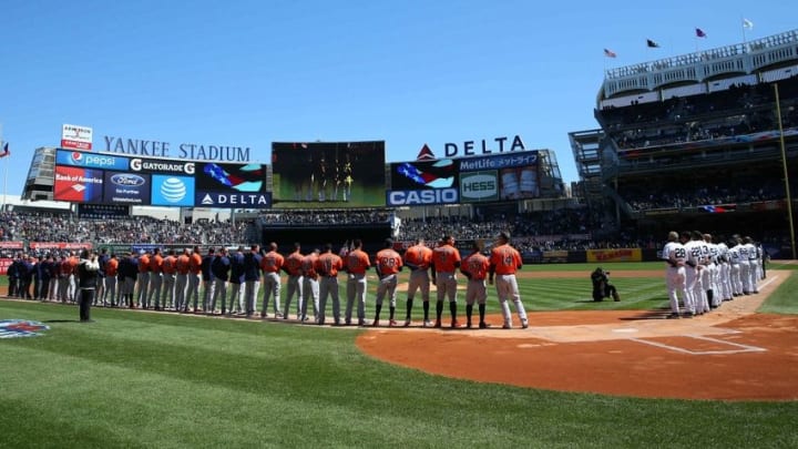 Apr 5, 2016; Bronx, NY, USA; New York Yankees and the Houston Astros during the singing of the National Anthem before the game at Yankee Stadium. Mandatory Credit: Anthony Gruppuso-USA TODAY Sports