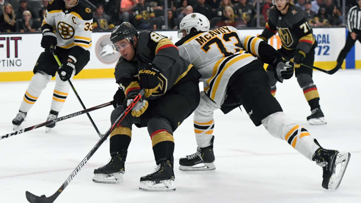 LAS VEGAS, NEVADA – OCTOBER 08: Jonathan Marchessault #81 of the Vegas Golden Knights skates with the puck against Charlie McAvoy #73 of the Boston Bruins in the second period of their game at T-Mobile Arena on October 8, 2019 in Las Vegas, Nevada. The Bruins defeated the Golden Knights 4-3. (Photo by Ethan Miller/Getty Images)