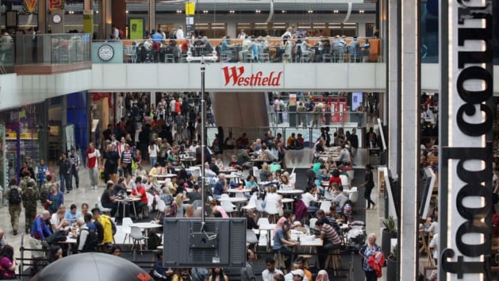 STRATFORD, ENGLAND - JULY 31: Members of the public dine in the food court of the giant Westfield Stratford shopping mall adjacent to the Olympic Park on July 31, 2012 in London, England. Trading in the huge 1.9 million sq ft mall has been boosted by the footfall of spectators, volunteers and competitors from the Olympic Park; whilst shops and restaurants in London's West End are reporting up to 70% declines in revenue. (Photo by Oli Scarff/Getty Images)