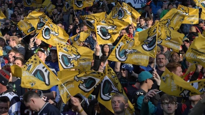 Oct 2, 2016; London, United Kingdom; Jacksonville Jaguars fans wave flags during game 15 of the NFL International Series against the Indianapolis Colts at Wembley Stadium. Mandatory Credit: Kirby Lee-USA TODAY Sports