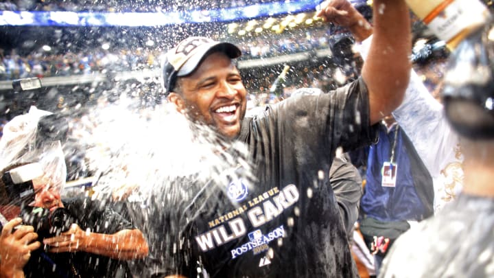 MILWAUKEE – SEPTEMBER 28: CC Sabathia of the Milwaukee Brewers is sprayed by champaign as he and the Brewers celebrate clinching the National League Wild Card after the game against the Chicago Cubs at Miller Park on September 28, 2008 in Milwaukee, Wisconsin. The Brewers defeated the Cubs 3-1. (Photo by Darren Hauck/Getty Images)