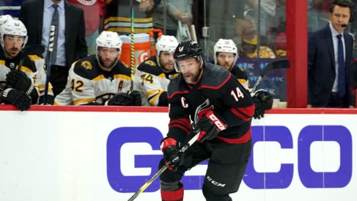 RALEIGH, NC - MAY 16: Justin Williams #14 of the Carolina Hurricanes skates with the puck in Game Four of the Eastern Conference Third Round against the Boston Bruins during the 2019 NHL Stanley Cup Playoffs on May 16, 2019 at PNC Arena in Raleigh, North Carolina. (Photo by Gregg Forwerck/NHLI via Getty Images)
