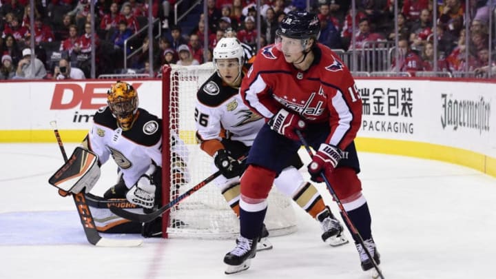 WASHINGTON, DC - DECEMBER 02: Nicklas Backstrom #19 of the Washington Capitals skates with the puck against Brandon Montour #26 of the Anaheim Ducks in the third period at Capital One Arena on December 2, 2018 in Washington, DC. (Photo by Patrick McDermott/NHLI via Getty Images)