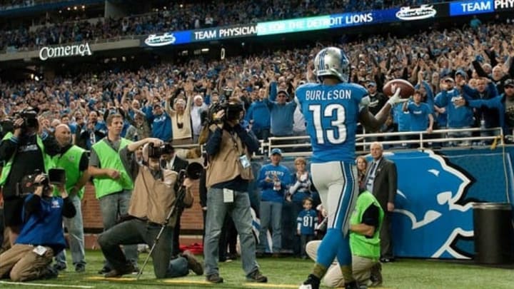 Nov 24, 2013; Detroit, MI, USA; Detroit Lions wide receiver Nate Burleson (13) celebrates his touchdown during the second quarter against the Tampa Bay Buccaneers at Ford Field. Mandatory Credit: Tim Fuller-USA TODAY Sports