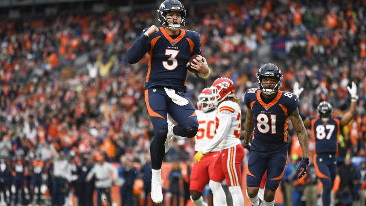 DENVER, COLORADO – JANUARY 08: Drew Lock #3 of the Denver Broncos rushes for a touchdown during the first quarter against the Denver Broncos at Empower Field At Mile High on January 08, 2022 in Denver, Colorado. (Photo by Dustin Bradford/Getty Images)