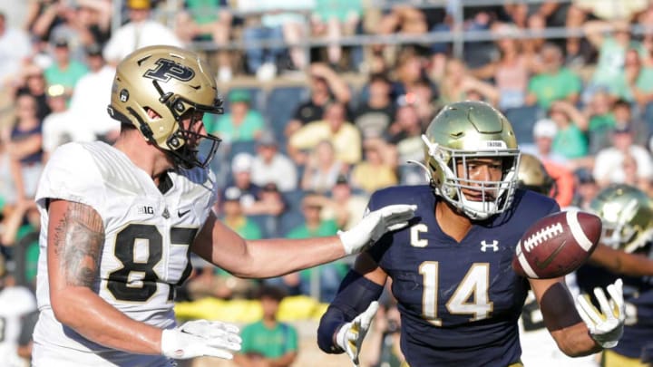 Notre Dame safety Kyle Hamilton (14) intercepts a pass intended for Purdue tight end Payne Durham (87) in the end zone during the fourth quarter of an NCAA football game, Saturday, Sept. 18, 2021, at Notre Dame Stadium in South Bend.If Notre Dame Vs Purdue