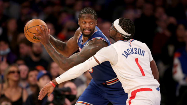 Jan 23, 2022; New York, New York, USA; New York Knicks forward Julius Randle (30) controls the ball against Los Angeles Clippers guard Reggie Jackson (1) during the fourth quarter at Madison Square Garden. Mandatory Credit: Brad Penner-USA TODAY Sports