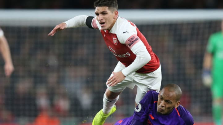 LONDON, ENGLAND - NOVEMBER 03: Lucas Torreira of Arsenal is tackled by Fabinho of Liverpool during the Premier League match between Arsenal FC and Liverpool FC at Emirates Stadium on November 3, 2018 in London, United Kingdom. (Photo by Mark Leech/Offside/Getty Images)