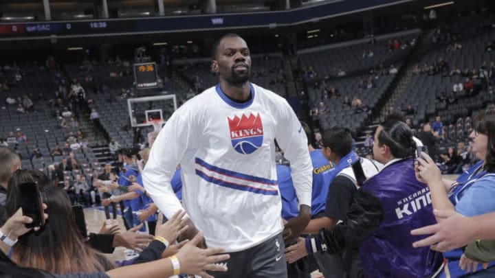 SACRAMENTO, CA - NOVEMBER 19: Dewayne Dedmon #13 of the Sacramento Kings greets fans while running onto the court against the Phoenix Suns on November 19, 2019 at Golden 1 Center in Sacramento, California. NOTE TO USER: User expressly acknowledges and agrees that, by downloading and or using this photograph, User is consenting to the terms and conditions of the Getty Images Agreement. Mandatory Copyright Notice: Copyright 2019 NBAE (Photo by Rocky Widner/NBAE via Getty Images)