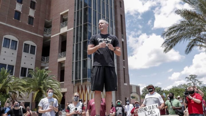 TALLAHASSEE, FL - JUNE 13: Head Coach Mike Norvell of the Florida State Football Team speaks with fans before his team a unity walk on June 13, 2020 in Tallahassee, Florida. Florida State players and members of the football coaching staff led fans and supporters on a unity walk from the Doak Campbell Stadium on the Florida State University campus to the state capitol building in support of the Black Lives Matter movement. Protests erupted across the nation after George Floyd died in police custody in Minneapolis, Minnesota on May 25th. (Photo by Don Juan Moore/Getty Images)