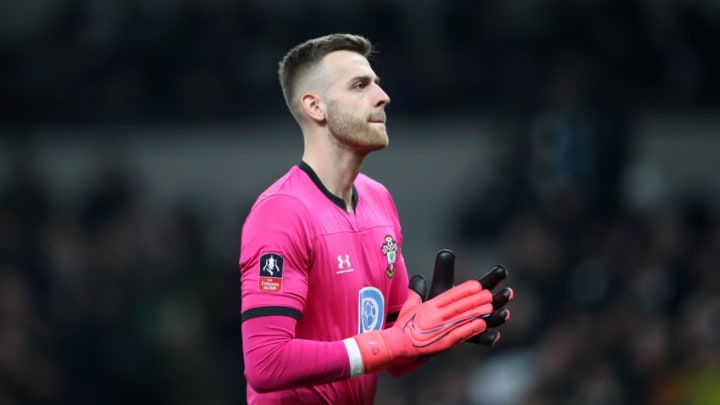 LONDON, ENGLAND - FEBRUARY 05: Angus Gunn of Southampton during the FA Cup Fourth Round Replay match between Tottenham Hotspur and Southampton FC at Tottenham Hotspur Stadium on February 5, 2020 in London, England. (Photo by Marc Atkins/Getty Images)