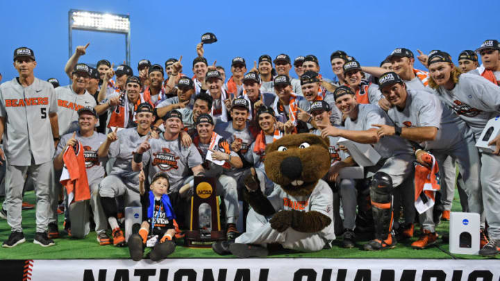 Omaha, NE - JUNE 28: The Oregon State Beavers pose for a team photo and celebrate after defeating the Arkansas Razorbacks for the National Championship during the College World Series Championship Series on June 28, 2018 at TD Ameritrade Park in Omaha, Nebraska. (Photo by Peter Aiken/Getty Images)