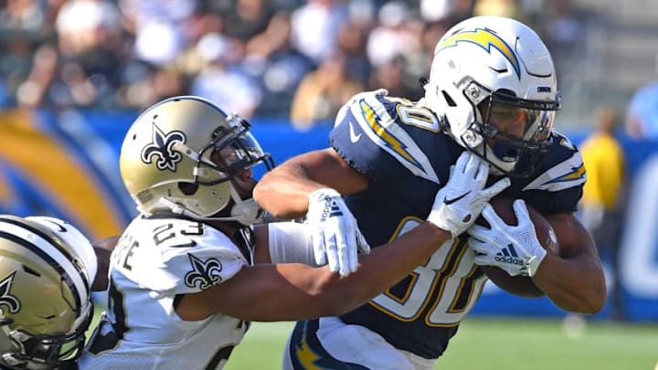 CARSON, CA - AUGUST 25: Marshon Lattimore #23 of the New Orleans Saints forces Austin Ekeler #30 of the Los Angeles Chargers out of bounds after he runs for a first down in the first quarter of the pre-season game at StubHub Center on August 25, 2018 in Carson, California. (Photo by Jayne Kamin-Oncea/Getty Images)