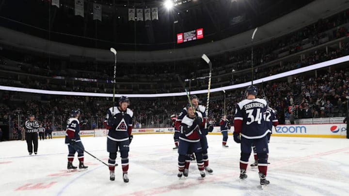 DENVER, CO - FEBRUARY 20: Members of the Colorado Avalanche salute the crowd after the victory against the Winnipeg Jets at the Pepsi Center on February 20, 2019 in Denver, Colorado. (Photo by Michael Martin/NHLI via Getty Images)