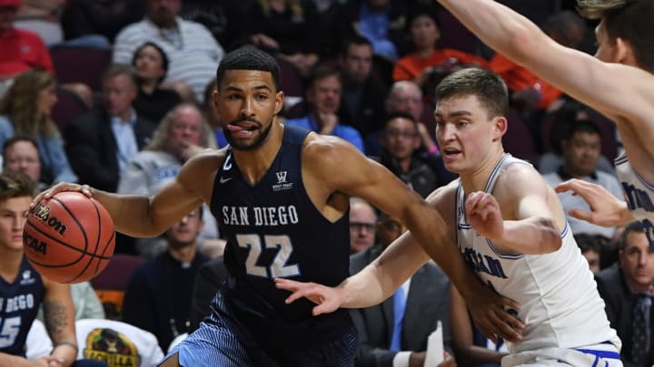 LAS VEGAS, NV – MARCH 03: Isaiah Wright #22 of the San Diego Toreros drives against McKay Cannon #24 of the Brigham Young Cougars during a quarterfinal game of the West Coast Conference basketball tournament at the Orleans Arena on March 3, 2018 in Las Vegas, Nevada. The Cougars won 85-79. (Photo by Ethan Miller/Getty Images)