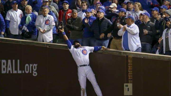 Oct 30, 2016; Chicago, IL, USA; Chicago Cubs right fielder Jason Heyward (22) makes a catch against Cleveland Indians starting pitcher Trevor Bauer (not pictured) for an out during the third inning in game four of the 2016 World Series at Wrigley Field. Mandatory Credit: Jerry Lai-USA TODAY Sports