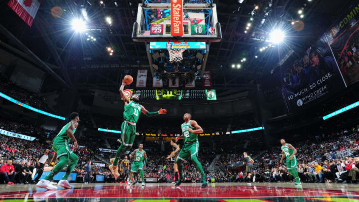 ATLANTA, GA - NOVEMBER 18: Kyrie Irving #11 of the Boston Celtics grabs the rebound against the Atlanta Hawks on November 18, 2017 at Philips Arena in Atlanta, Georgia. NOTE TO USER: User expressly acknowledges and agrees that, by downloading and/or using this Photograph, user is consenting to the terms and conditions of the Getty Images License Agreement. Mandatory Copyright Notice: Copyright 2017 NBAE (Photo by Scott Cunningham/NBAE via Getty Images)