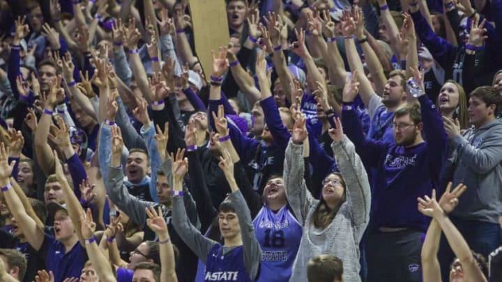 MANHATTAN, KS - FEBRUARY 05: K-State student section signal a three point shot as a player successfully completes one during the Big 12 regular season game between the Kansas Jayhawks and Kansas State Wildcats, on Tuesday, February 5th, 2019 at Bramlage Coliseum in Manhattan, Kansas. (Photo by Nick Tre. Smith/Icon Sportswire via Getty Images)