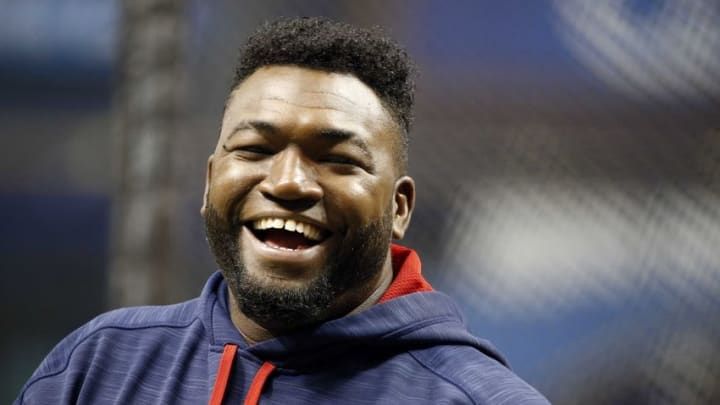 Aug 22, 2016; St. Petersburg, FL, USA; Boston Red Sox designated hitter David Ortiz (34) laughs as he works out prior to the game against the Tampa Bay Rays at Tropicana Field. Mandatory Credit: Kim Klement-USA TODAY Sports