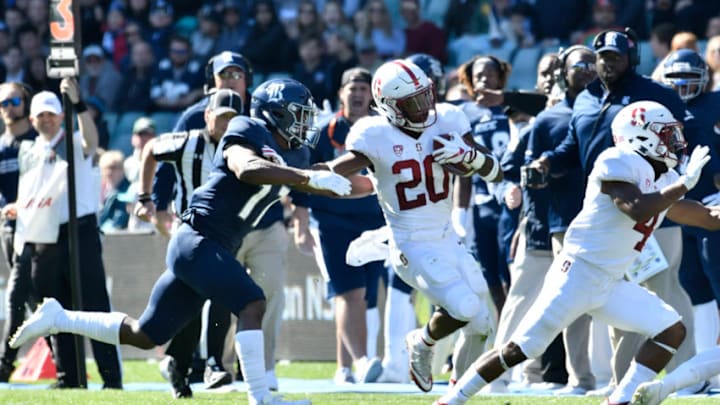 August 27th 2017, Allianz Stadium, Sydney, Australia; College Football Sydney Cup; Rice University v Stanford University; Standford Cardinals running back Bryce Love fends off Rice Owls safety JT Ibe; (Photo by Nigel Owen/Action Plus via Getty Images)