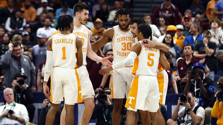 Mar 13, 2022; Tampa, FL, USA; Tennessee Volunteers guard Kennedy Chandler (1) and forward John Fulkerson (10) and guard Josiah-Jordan James (30) and guard Zakai Zeigler (5) and guard Santiago Vescovi (25) huddle during the first half against the Texas A&M Aggies at Amalie Arena. Mandatory Credit: Kim Klement-USA TODAY Sports