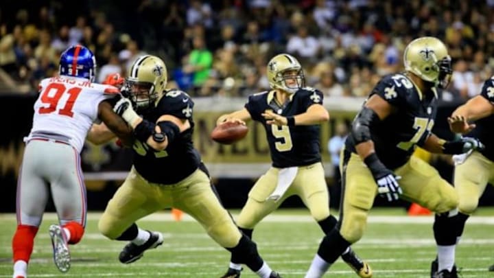 Nov 1, 2015; New Orleans, LA, USA; New Orleans Saints quarterback Drew Brees (9) looks to pass against the New York Giants during the second quarter of a game at the Mercedes-Benz Superdome. Mandatory Credit: Derick E. Hingle-USA TODAY Sports