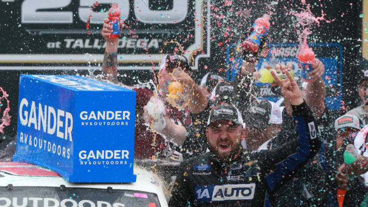 TALLADEGA, ALABAMA - OCTOBER 12: Spencer Boyd, driver of the #20 Alabama Roofing Professionals Chevrolet, celebrates in victory lane after winning the NASCAR Gander Outdoor Truck Series Sugarlands Shine 250 at Talladega Superspeedway on October 12, 2019 in Talladega, Alabama. (Photo by Sean Gardner/Getty Images)