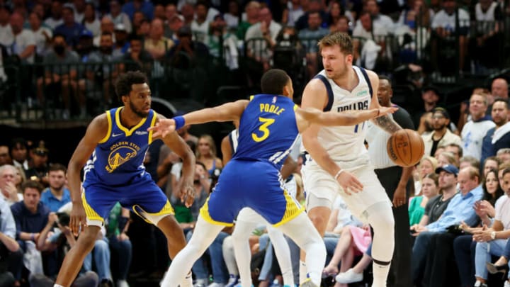 May 24, 2022; Dallas, Texas, USA; Dallas Mavericks guard Luka Doncic (77) dribbles the ball while defended by Golden State Warriors guard Jordan Poole (3) during the third quarter in game four of the 2022 Western Conference finals at American Airlines Center. Mandatory Credit: Kevin Jairaj-USA TODAY Sports