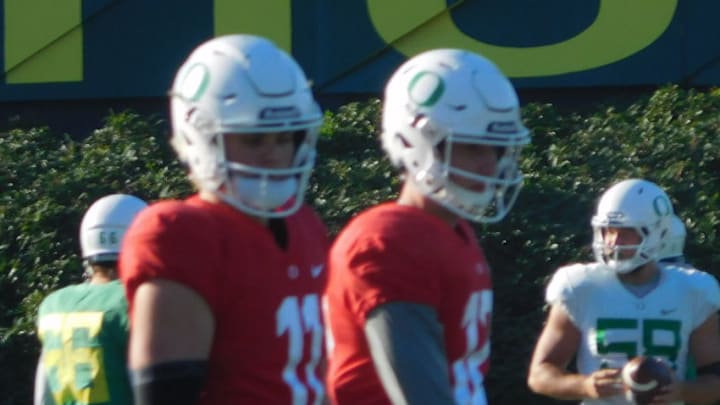 Oregon Football Quarterbacks Braxton Burmeister and Taylor Alie work drills in Practice.Justin Phillips/KPNW Sports