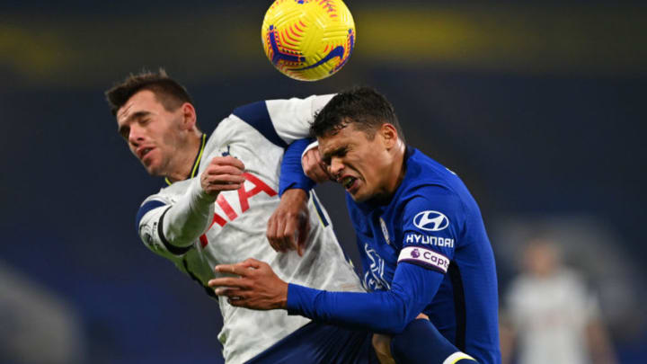 LONDON, ENGLAND - NOVEMBER 29: Thiago Silva of Chelsea and Giovani Lo Celso of Tottenham Hotspur battle for the ball during the Premier League match between Chelsea and Tottenham Hotspur at Stamford Bridge on November 29, 2020 in London, England. Sporting stadiums around the UK remain under strict restrictions due to the Coronavirus Pandemic as Government social distancing laws prohibit fans inside venues resulting in games being played behind closed doors. (Photo by Justin Tallis - Pool/Getty Images)