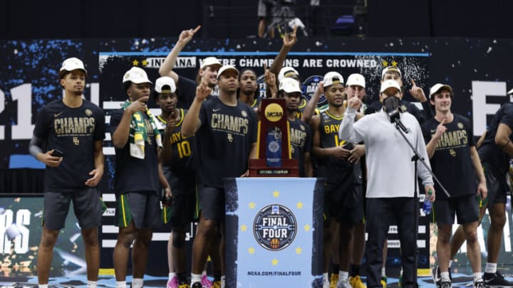 INDIANAPOLIS, INDIANA - APRIL 05: The Baylor Bears pose with the National Championship trophy after defeating the Gonzaga Bulldogs 86-70 in the National Championship game of the 2021 NCAA Men's Basketball Tournament at Lucas Oil Stadium on April 05, 2021 in Indianapolis, Indiana. (Photo by Jamie Squire/Getty Images)