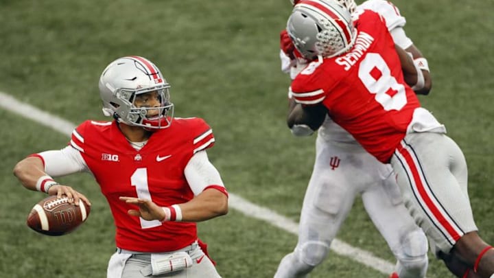 Ohio State Buckeyes running back Trey Sermon (8) blocks for quarterback Justin Fields (1) on a pass against Indiana Hoosiers during the third quarter in their NCAA Division I football game on Saturday, Nov. 21, 2020 at Ohio Stadium in Columbus, Ohio.Osu20ind Kwr27