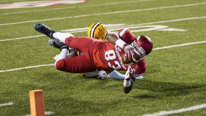 Nov 12, 2016; Fayetteville, AR, USA; Arkansas Razorbacks tight end Jeremy Sprinkle (83) stretches for the end zone during the fourth quarter of the game against the LSU Tigers at Donald W. Reynolds Razorback Stadium. LSU won 38-10. Mandatory Credit: Brett Rojo-USA TODAY Sports