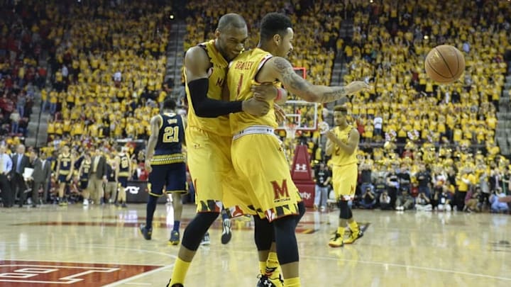 Feb 21, 2016; College Park, MD, USA; Maryland Terrapins guard Rasheed Sulaimon (0) and guard Jaylen Brantley (1) celebrate after defeating the Michigan Wolverines 86-82 at Xfinity Center. Mandatory Credit: Tommy Gilligan-USA TODAY Sports
