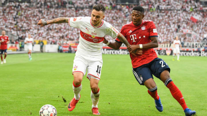 01.09.2018, Baden-Württemberg, Stuttgart: Soccer: Bundesliga, VfB Stuttgart - Bayern Munich, 2nd matchday in the Mercedes-Benz Arena: Stuttgart's Anastasios Donis (l) and Bavaria's David Alaba (r) are fighting for the ball. Photo: Sebastian Gollnow/dpa - WICHTIGER HINWEIS: Gemäß den Vorgaben der DFL Deutsche Fußball Liga ist es untersagt, in dem Stadion und/oder vom Spiel angefertigte Fotoaufnahmen in Form von Sequenzbildern und/oder videoähnlichen Fotostrecken zu verwerten bzw. verwerten zu lassen. (Photo by Sebastian Gollnow/picture alliance via Getty Images)