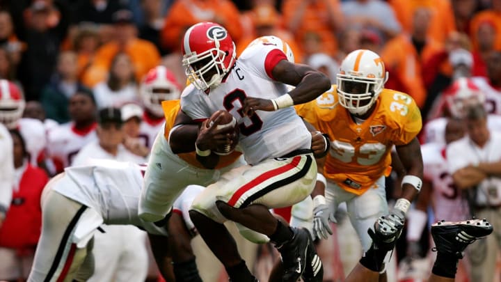 D.J. Shockley jumps over a defender during a game against the Tennessee Volunteers. (Photo by Streeter Lecka/Getty Images)