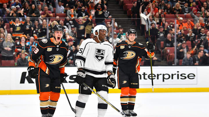 ANAHEIM, CA - SEPTEMBER 26: Anaheim Ducks left wing Max Comtois (53) reacts to a goal as center Isac Lundestrom (48 looks on and Los Angeles Kings left wing Bokondji Imama (55) looks on during a NHL preseason game between the Los Angeles Kings and the Anaheim Ducks played on September 26, 2018 at the Honda Center in Anaheim, CA.