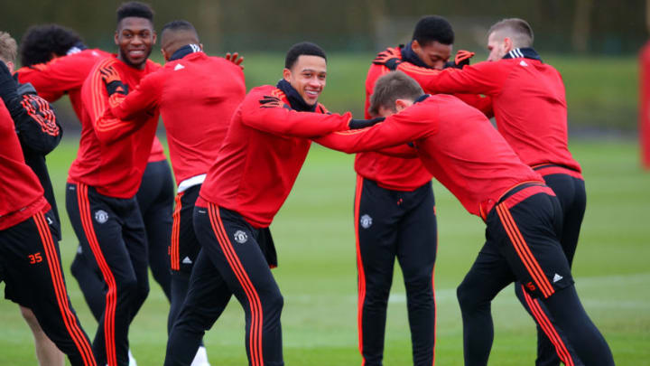 MANCHESTER, ENGLAND - MARCH 09: Memphis Depay of Manchester United smiles during a training session ahead of the UEFA Europa League round of 16 first leg match between Liverpool and Manchester United at Aon Training Complex on March 9, 2016 in Manchester, England. (Photo by Dave Thompson/Getty Images)