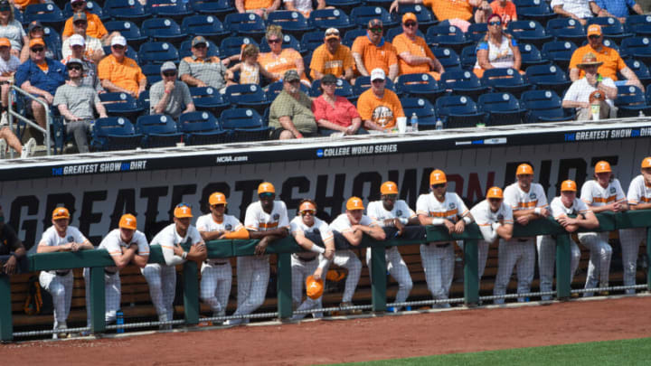 Jun 20, 2021; Omaha, Nebraska, USA; The Tennessee Volunteers watches action in the ninth inning against the Virginia Cavaliers at TD Ameritrade Park. Mandatory Credit: Steven Branscombe-USA TODAY Sports
