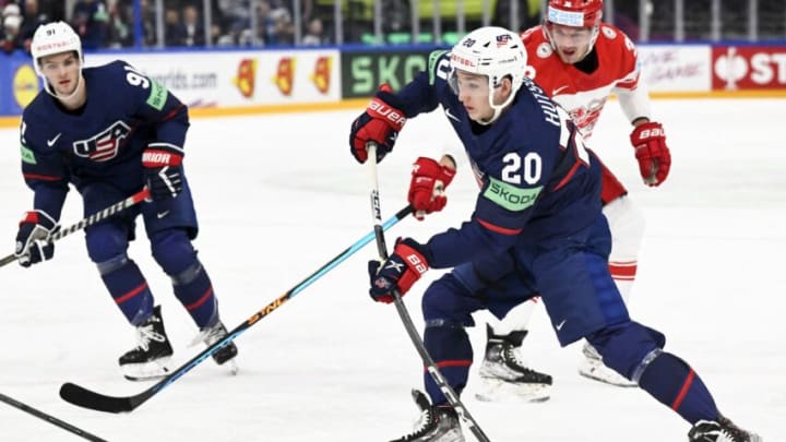 USA's forward Carter Mazur (L), USA's defender Lane Hutson (C) and Denmark's forward Morten Poulsen vie during the IIHF Ice Hockey Men's World Championships Preliminary Round - Group A match between USA and Denmark in Tampere, Finland, on May 20, 2023. (Photo by Vesa Moilanen / Lehtikuva / AFP) / Finland OUT (Photo by VESA MOILANEN/Lehtikuva/AFP via Getty Images)