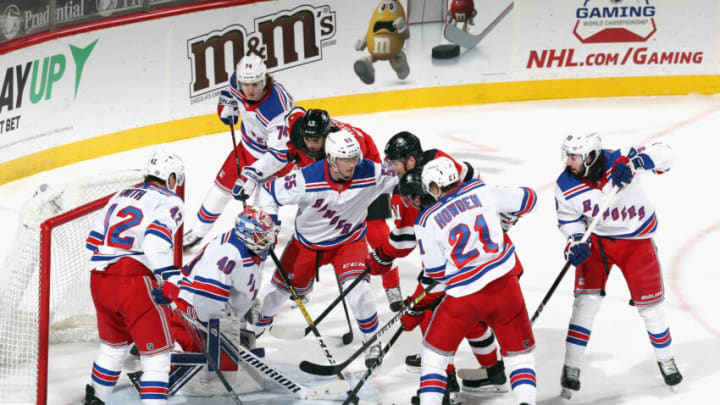 The New York Rangers defend against the New Jersey Devils (Photo by Bruce Bennett/Getty Images)