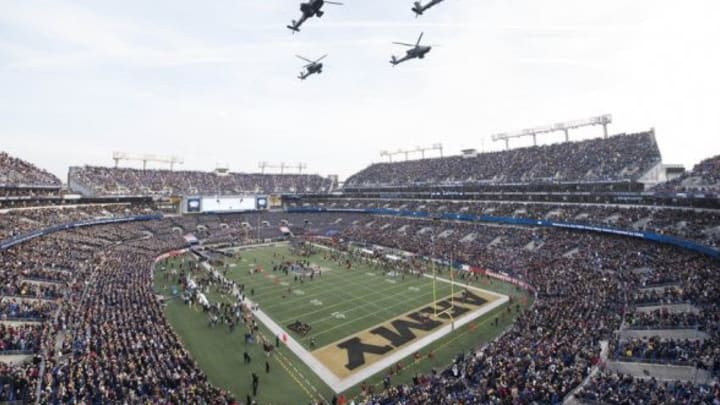 Dec 13, 2014; Baltimore, MD, USA; Army helicopters fly over the stadium prior to the 115th annual Army-Navy game between the Army Black Knights and the Navy Midshipmen at M&T Bank Stadium. Mandatory Credit: Tommy Gilligan-USA TODAY Sports