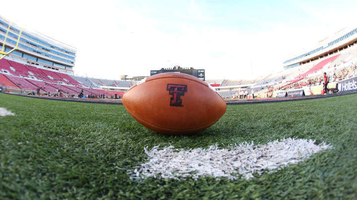 Oct 31, 2020; Lubbock, Texas, USA; A Texas Tech Red Raiders football sits on the field before the game against the Oklahoma Sooners at Jones AT&T Stadium. Mandatory Credit: Michael C. Johnson-USA TODAY Sports