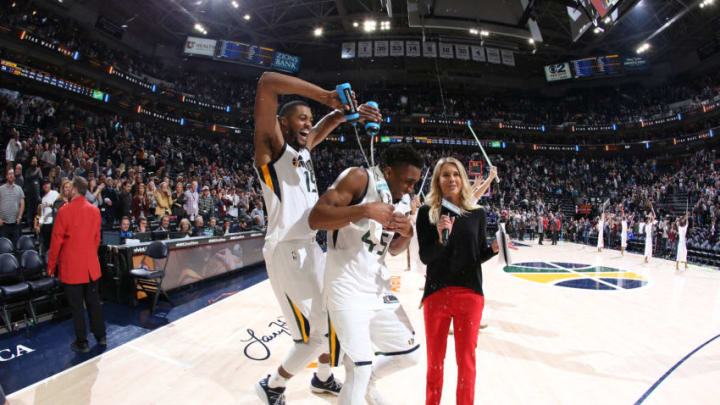 SALT LAKE CITY, UT - DECEMBER 1: Derrick Favors #15 pours water on Donovan Mitchell #45 of the Utah Jazz after the game against the New Orleans Pelicans on December 1, 2017 at vivint.SmartHome Arena in Salt Lake City, Utah. NOTE TO USER: User expressly acknowledges and agrees that, by downloading and or using this Photograph, User is consenting to the terms and conditions of the Getty Images License Agreement. Mandatory Copyright Notice: Copyright 2017 NBAE (Photo by Melissa Majchrzak/NBAE via Getty Images)