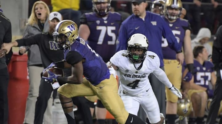 Dec 2, 2016; Santa Clara, CA, USA; Washington Huskies wide receiver John Ross (1) runs for a touchdown after a catch defended by Colorado Buffaloes defensive back Chidobe Awuzie (4) in the third quarter during the Pac-12 championship at Levi