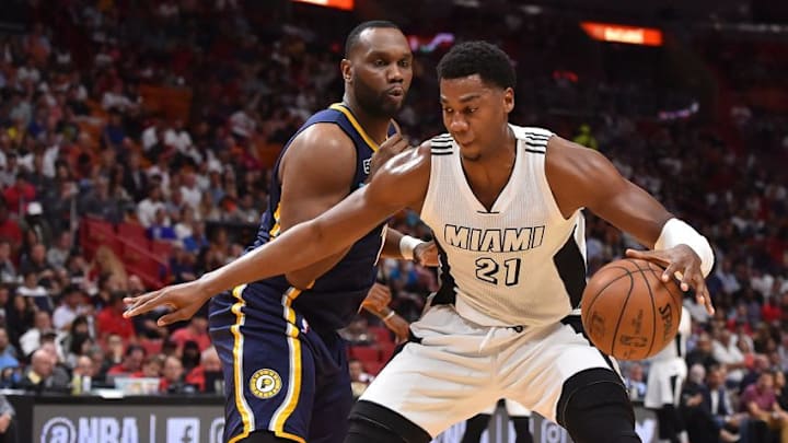 Dec 14, 2016; Miami, FL, USA; Miami Heat center Hassan Whiteside (21) controls the ball around Indiana Pacers center Al Jefferson (7) during the second half at American Airlines Arena. The Miami Heat defeat Indiana Pacers 95-89. Mandatory Credit: Jasen Vinlove-USA TODAY Sports