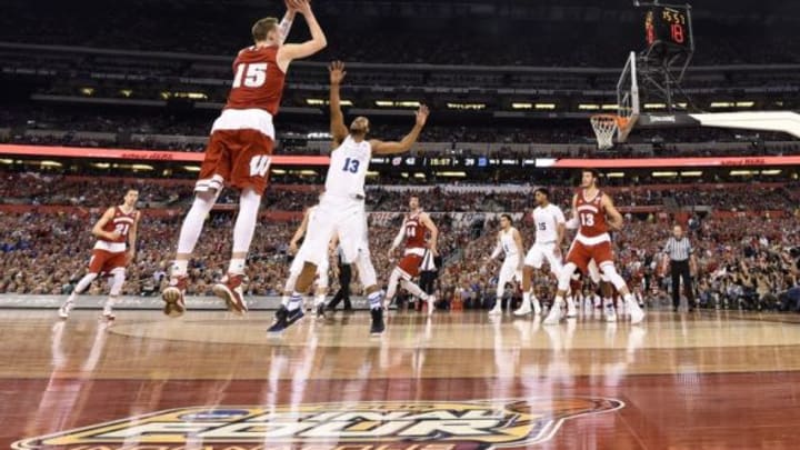 Apr 6, 2015; Indianapolis, IN, USA; Wisconsin Badgers forward Sam Dekker (15) shoots a three over Duke Blue Devils guard Matt Jones (13) in the second half in the 2015 NCAA Men’s Division I Championship game at Lucas Oil Stadium. Mandatory Credit: Bob Donnan-USA TODAY Sports